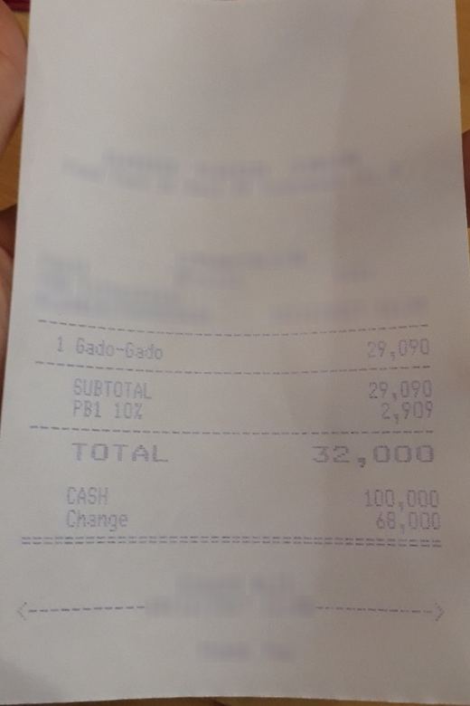 The selected receipt photo with the chosen damage applied